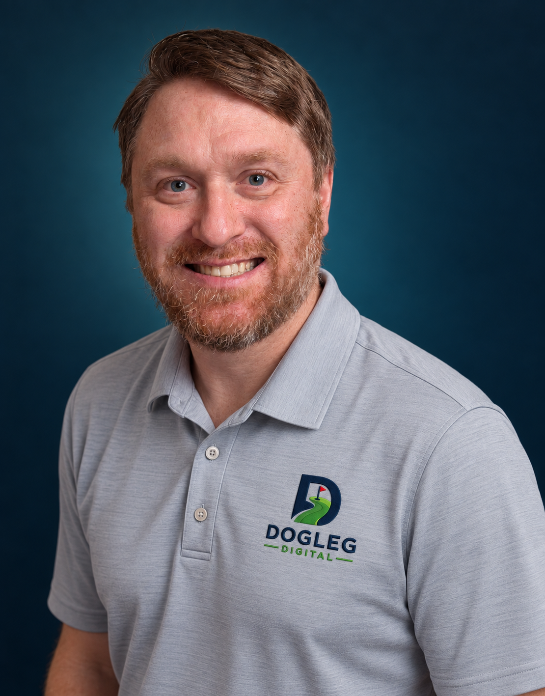 Ryan Drumheller wearing a gray Dogleg Digital polo